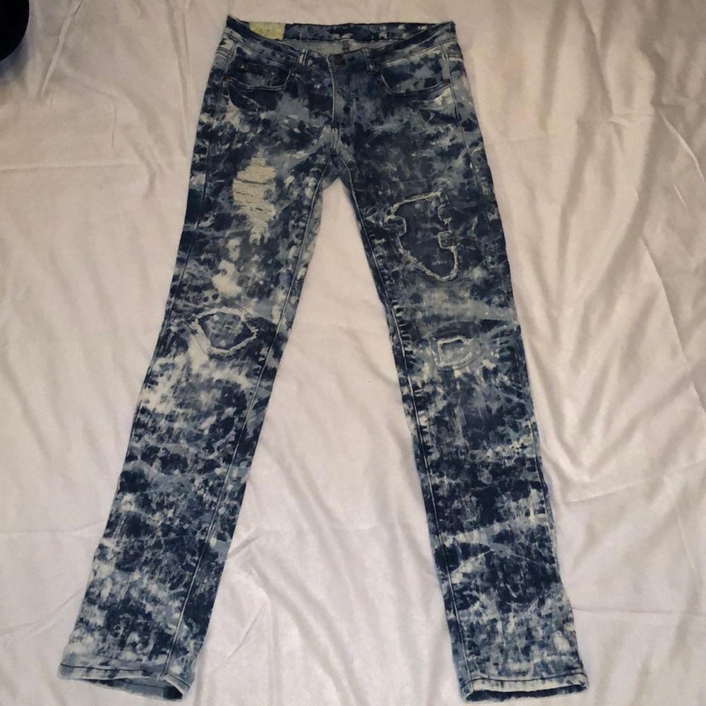 Machine acid wash jeans.
